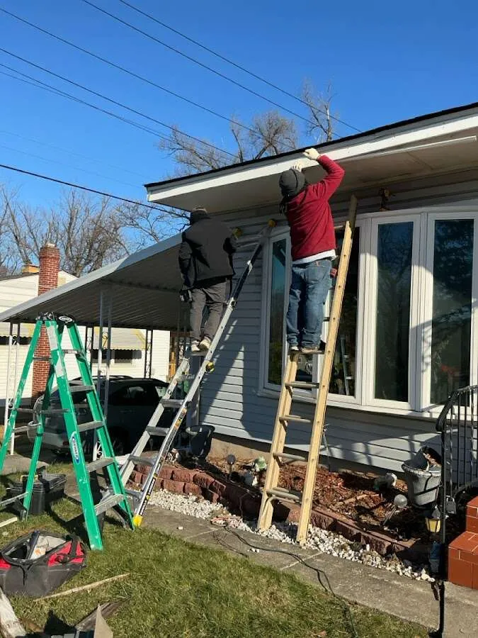 Restoration crew performing exterior repair in Derby